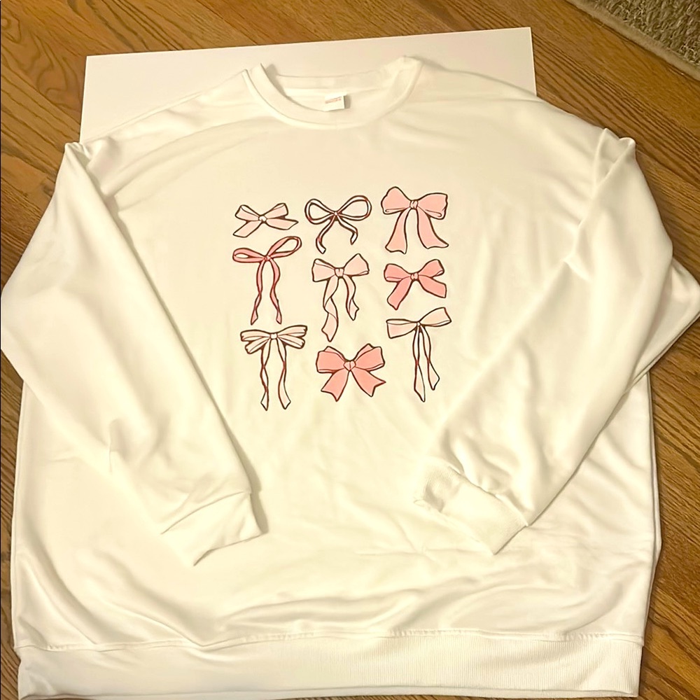 White Sweatshirt with Pink Bow Designs